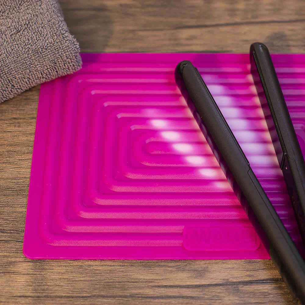 Heat pad for shop straighteners