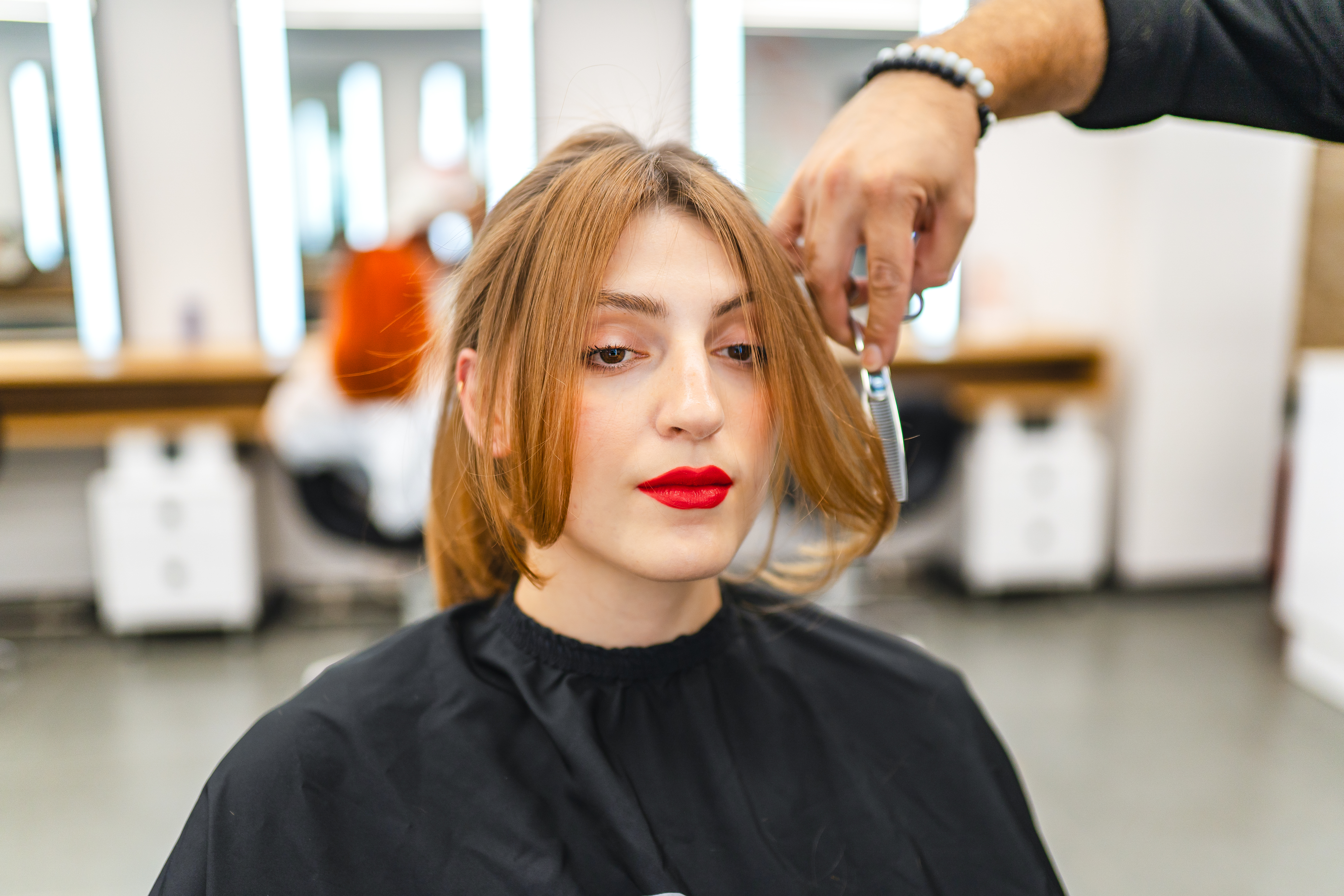 Woman getting a hair cut Image of woman getting her hair cut