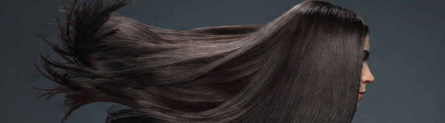 High-impact shine on dark hair is a technical result, not an accident.
